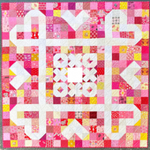 Let's get wrapped in love with Loventwined quilt - Craftapalooza Designs